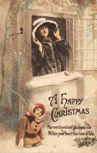 A HAPPY CHRISTMAS Woman Girl Snow c1910s Hand-Colored Tuck Vintage Postcard