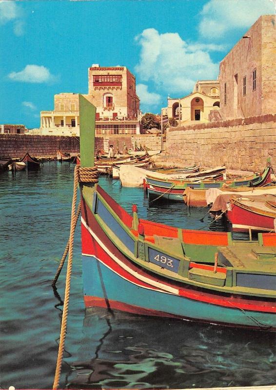 GG10971 malta st paul s bay fishing boats  restaurant  germany