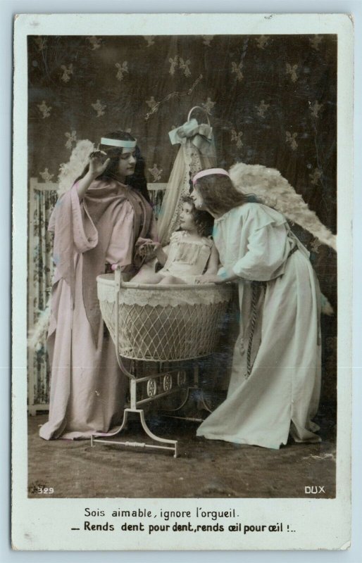 Postcard Girls Dressed As Angels Girl in Bassinet Tinted RPPC Real Photo AE13