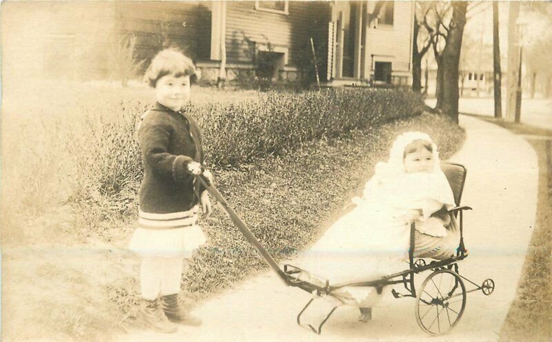 Boy Girl in full Cart C-1910 RPPC Photo Postcard 20-6897