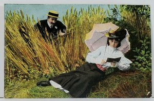 Victorian Romance Woman Reading Man Peeping from Wheat Field c1910 Postcard C17