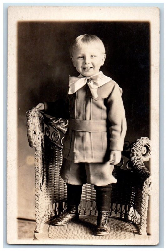 c1910's Cute Little Boy Standing Chair Studio Portrait RPPC Photo Postcard
