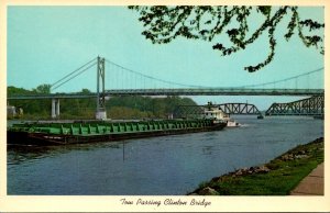 Iowa Clinton Tugboat and Barge Passing Clinton Bridge