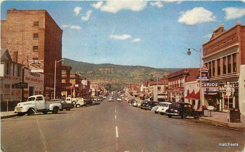 1958 RATON NEW MEXICO Business Section automobiles Noble postcard 742