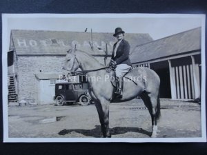 LADY ON HORSE BACK IN HOTEL GARAGE COURTYARD early RP Postcard