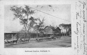 TRAIN DEPOT RAILROAD STATION RUTLAND VERMONT HORSE WAGONS POSTCARD 1905