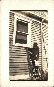 Bizarre Unusal Child on Ladder Creepy Halloween Mask Real Photo Postcard 