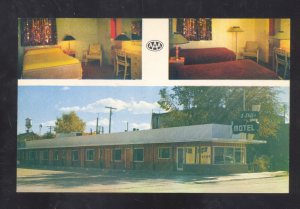 LOVELOCK NEVADA TWO STIFFS SELLING GAS MOTEL INTERIOR ADVERTISING POSTCARD