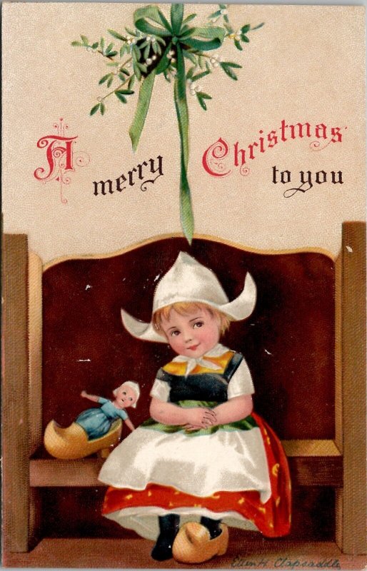 Christmas Ellen Clapsaddle Dutch Girl Doll Waiting Under Mistletoe Postcard X13