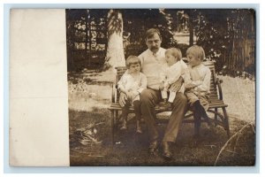 c1910 Children Boys Father Grandfather Bench Garden Chicago RPPC Photo Postcard