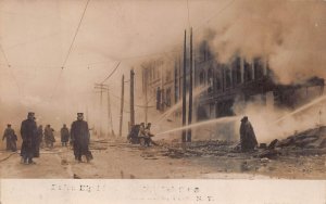 RPPC UTICA NEW YORK FIRE FIGHTING REAL PHOTO POSTCARD (c. 1910)