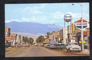 TOWNSEND MONTANA DOWNTOWN STREET SCENE OLD CARS WATER TOWER POSTCARD