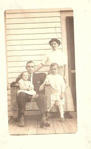 RPPC Postcard Family Portrait on Porch Mom Dad 2 Kids Marquette Heights