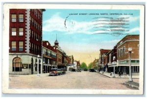 c1920's Locust Street Dirt Road Classic Car Building Centralia Illinois Postcard