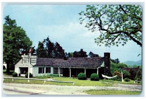 c1960's The Spinning Wheel Log Cabins Asheville North Carolina NC Trees Postcard