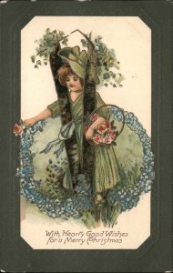 Christmas Little Girl in Green Among Flowers Embossed c1910 Vintage Postcard