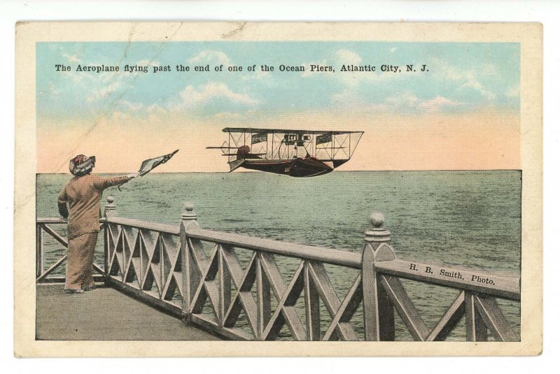 NJ - Atlantic City. Aeroplane Flying Past an Ocean Pier  (creases)