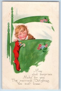 Gibson Postcard Christmas Child With Teddy Bear Stocking Full Of Toys c1910's