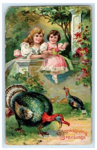 1909 Thanksgiving Greetings Mother And Child Feeding Turkeys Embossed Postcard 