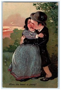 1908 Ugly Couple Kissing Romance When The Heart Is Young Embossed Postcard