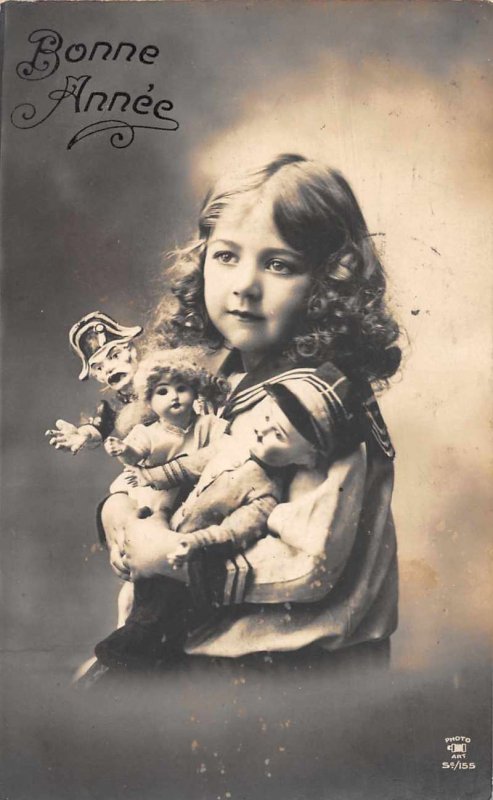 Bonne Anne New Year Greetings Girl with Dolls Real Photo Postcard JH231037