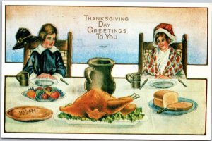 Postcard Thanksgiving  Boy and Girl eyeing turkey  on table