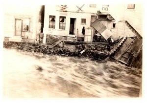 Raging water Flood , damaged house