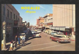 NOGALES ARIZONA DOWNTOWN STREET SCENE 1959 CHEVY CARS VINTAGE POSTCARD