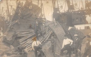 H77/ Interesting RPPC Postcard c1910 Ship Wreck? Disaster Men Cranes Dock 143