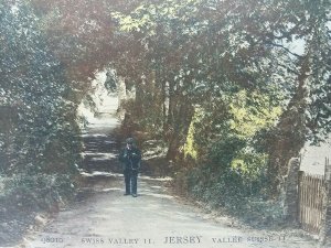 Man Reading Postcard Walking Through Swiss Valley Jersey Antique Postcard c1905