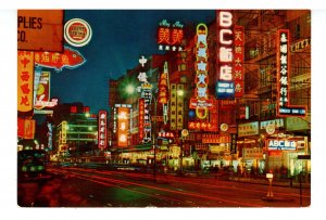 China - Hong Kong, Kowloon.  Night Street Scene (continental size)