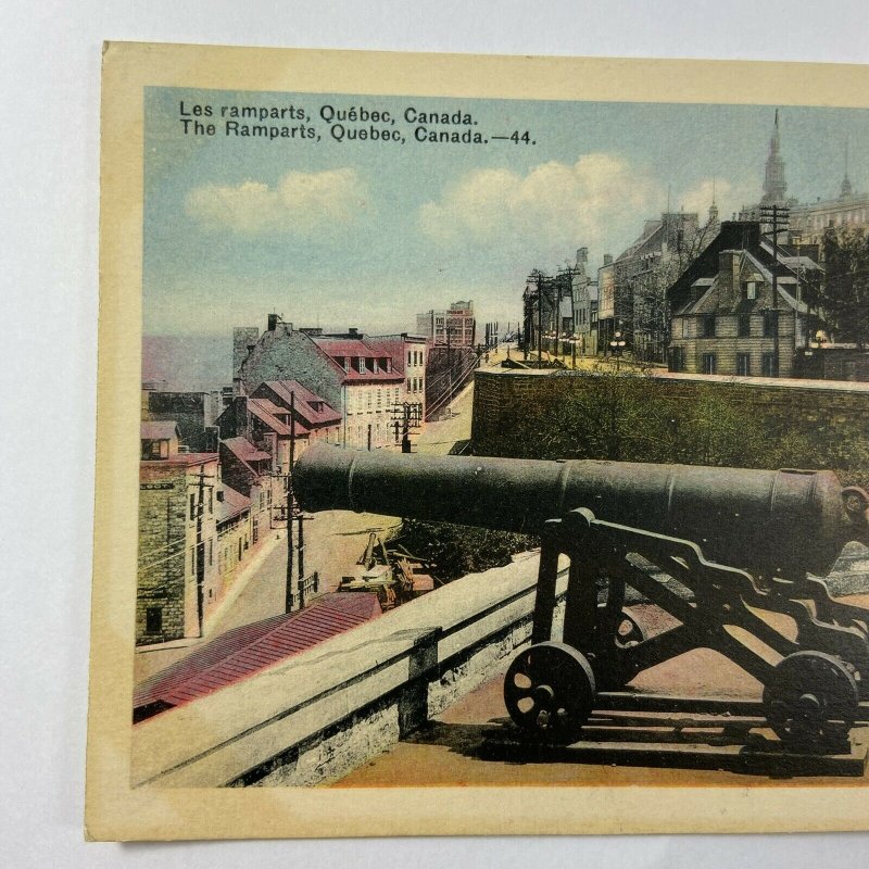 The Ramparts Quebec Canada Colored Canons Building Postcard Vintage