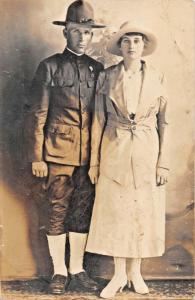 U S WW1 ARMY SOLDIER IN UNIFORM WITH WOMAN WIFE? REAL PHOTO POSTCARD