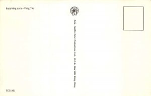 Vung Tau Vietnam Man Repairing Sails on Beach Vintage Postcard AA69278