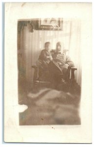 c1910's Grandpa Smoking Pipe Little Boy Sitting Chair RPPC Photo Postcard 