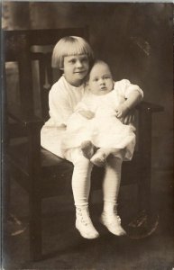 RPPC Big Sister Holds Baby Sibling for Photo Children Postcard U2