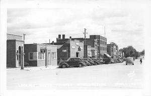 O'Neil NE Main Street Telephone Co. Storefronts Old Cars RPPC Postcard