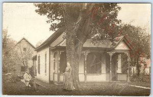 c1910s Man Adorable Little Dog RPPC Cute Small House Woodwork Photo Puppy  A174