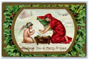 c1910's Christmas Angel Winter Bonfire Holly Berries Embossed Antique Postcard