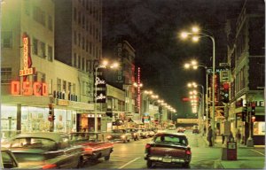 Postcard IL Rockford - West State Street Looking East at night cars Osco Drug