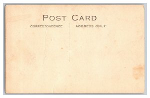 Postcard Young Man Sitting In Chair Worried Look On Face RPPC 