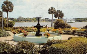 Flowers, Fountain and trees, Lake Eola Orlando, Florida Postcard