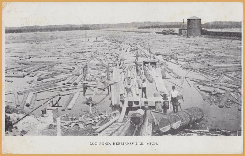 Hermansville, Mich., Men wrangling logs in the log pond, Logging-1916