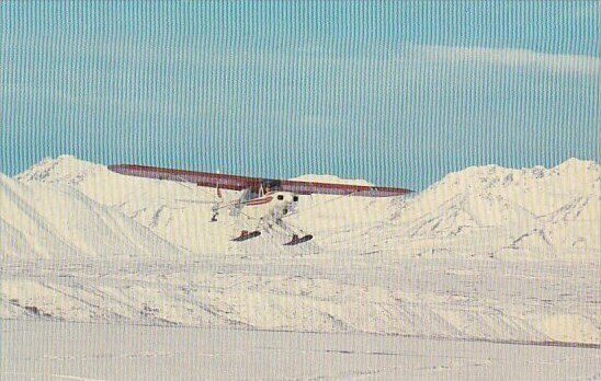 Supercub on Skis Landing On Summit Lake Anchorage Alaska