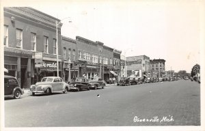 H24/ Greenville Michigan RPPC Postcard c1950 Gerald's Store Autos  16