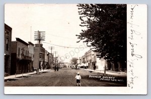 J90/ Princeton Wisconsin RPPC Postcard c1910 Main St Stores Child 34