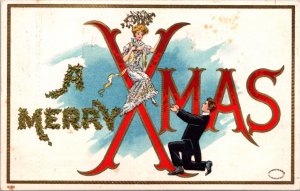 A Merry Xmas Postcard Man on One Knee Woman Sitting Under Mistletoe Christmas