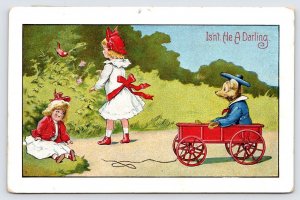 Girl with Doll and Anthropomorphic Bear in Wagon, Isn't He Darling Postcard  P3