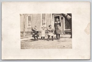 RPPC Edwardian Children On Swings Front Yard House Real Photo Postcard V28