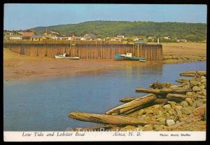 Low tide and Lobser Boat - Alma, N.B.